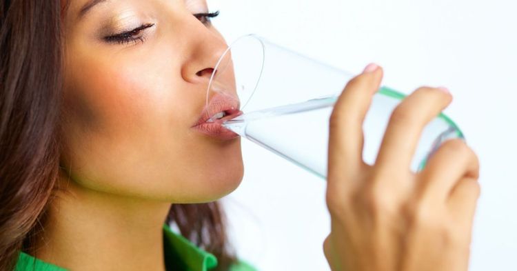 6 Ways Your Body Is Trying To Tell You You're Drinking Too Much Water