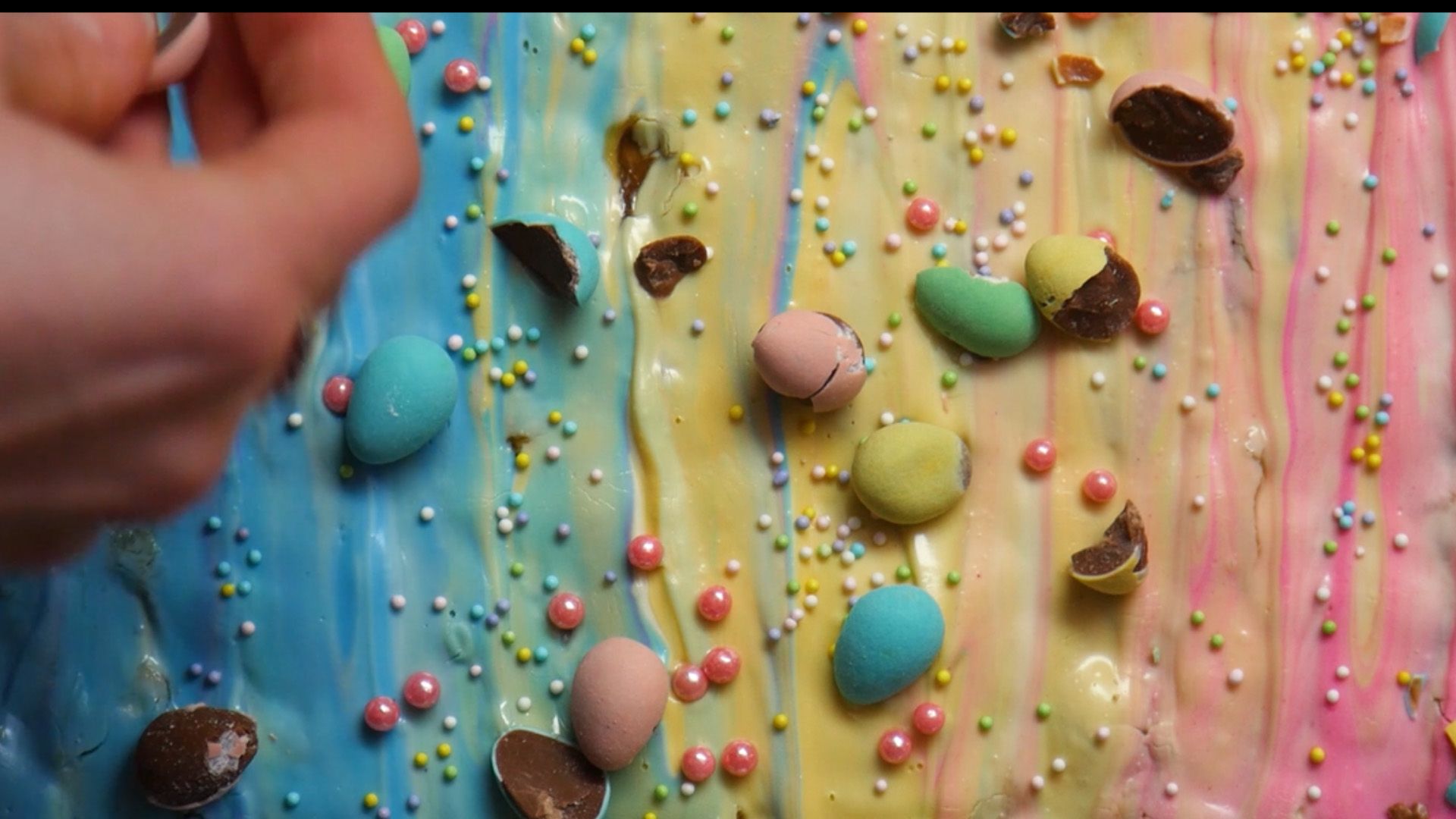 close up of mini eggs as topping on easter crack